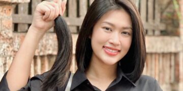 Hoa hậu Thiên Ân hiến tóc, tặng hoa cho phụ nữ nhân dịp 8/3