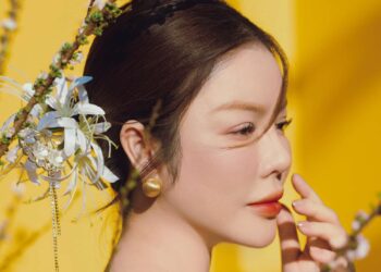 Lý Nhã Kỳ tỏa sáng trong tà áo dài giữa lòng Thảo Cầm Viên