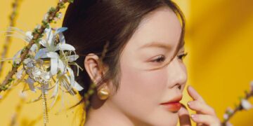 Lý Nhã Kỳ tỏa sáng trong tà áo dài giữa lòng Thảo Cầm Viên